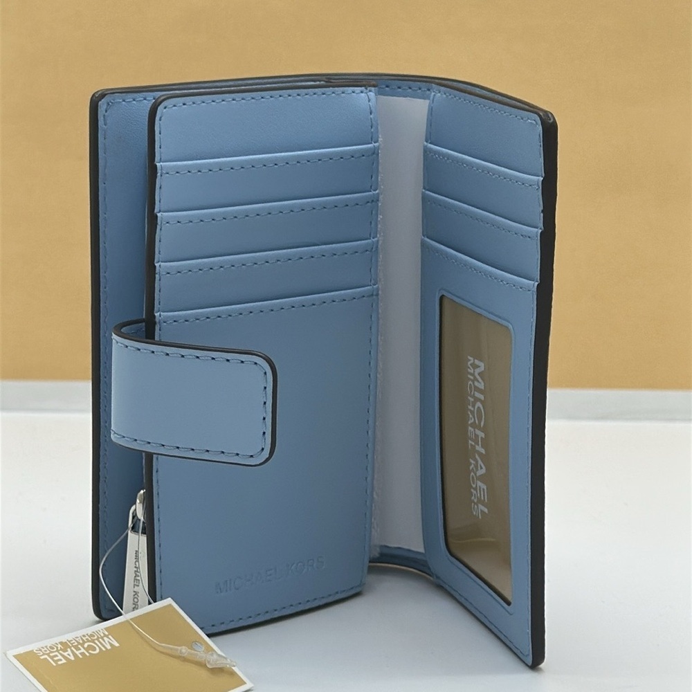Michael Kors Jet Set Travel Medium Printed Signature Logo Bi-Fold Wallet
LT SKY - Picture 10 of 16